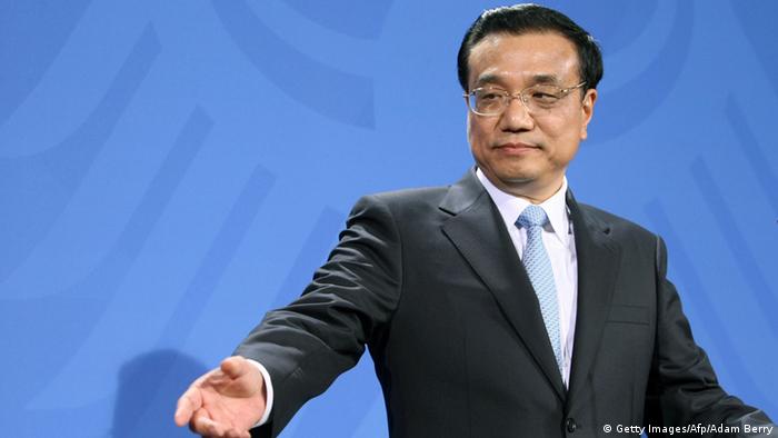 China's Prime Minister Li Keqiang gives a joint press conference with the German Chancellor at the Chancellery in Berlin, Germany on May 26, 2013. China's Premier Li Keqiang met German Chancellor Angela Merkel on Sunday as the close economic partners seek to weather a brewing trade spat between Beijing and the EU and forge deeper ties. AFP PHOTO / ADAM BERRY (Photo credit should read ADAM BERRY/AFP/Getty Images)