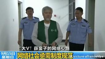 In this screen grab taken on 15 September 2013, Charles Xue Biqun (Xue Manzi), Chinese-American investor and Weibo celebrity who was detained last month on suspicion of soliciting prostitutes is seen during a report to police in Beijing, China. Chinese-American investor Charles Xue Biqun, a popular weibocommentator who was detained last month on suspicion of soliciting prostitutes, has offered to work with authorities in their internet crackdown to help secure his release, state media reported. Xues pledge was carried across state media on Sunday (15 September 2013) in what appeared to be the latest attempt by Beijing to justify its campaign against internet rumours and Big V or verified online celebrities who can command millions of followers. Xue - known as Xue Manzi to his 12 million followers on Sina Weibo told Beijing police that he had made mistakes with his online postings, and held himself out as an example of the need to regulate the internet, according to a Xinhua report. The report featured prominently on major news portals on the mainland on Sunday. Xue told police in a Beijing detention centre that online influence had fuelled his ego, adding that he had misled internet users on various incidents. 