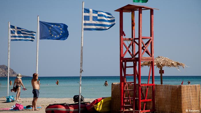 A beach in Crete with flags