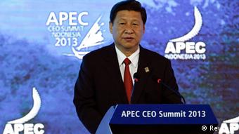 China's President Xi Jinping speaks at the Asia-Pacific Economic Cooperation (APEC) CEO Summit in Nusa Dua, on the Indonesian resort island of Bali October 7, 2013. REUTERS/Edgar Su (INDONESIA - Tags: POLITICS)