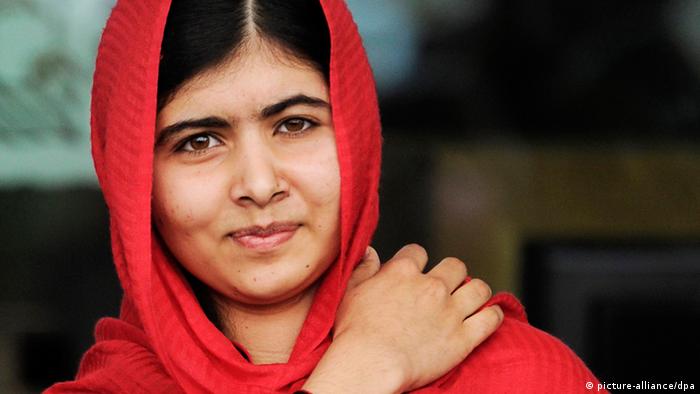 Malala Yousafzai in a red headscarf 