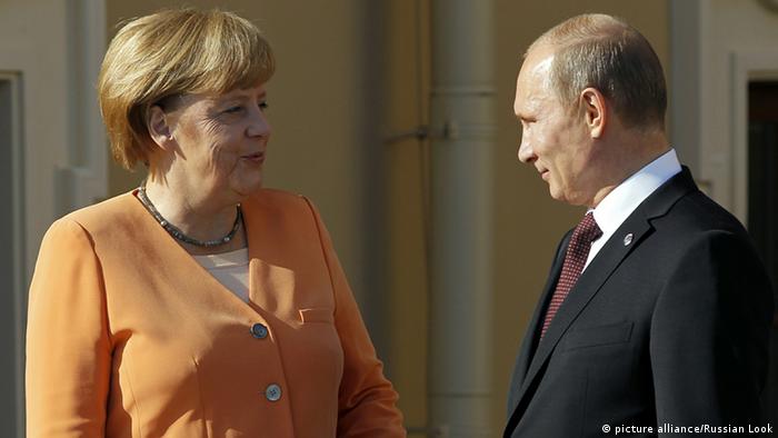 Merkel speaking with Putin