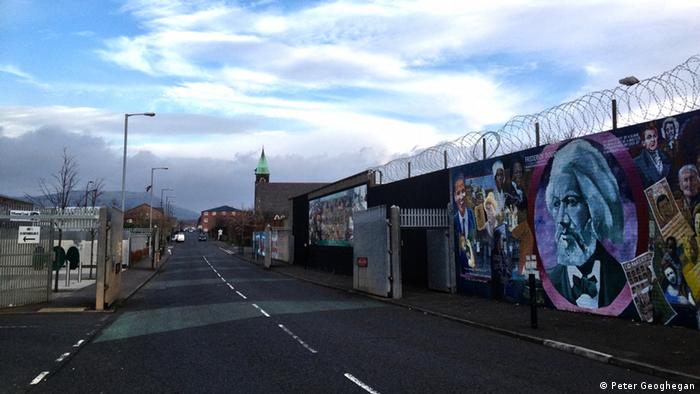 The peace wall separating Catholic and Protestant communities on Cupar Way in Belfast (Photo: Peter Geoghegan)
