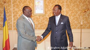CAR president Djotodia shakes hands with President Deby of Chad