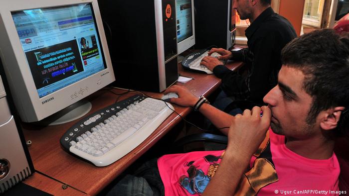 Man looking at a computer screen in an Internet café in Istanbul. (Photo: UGUR CAN/AFP/Getty Images)