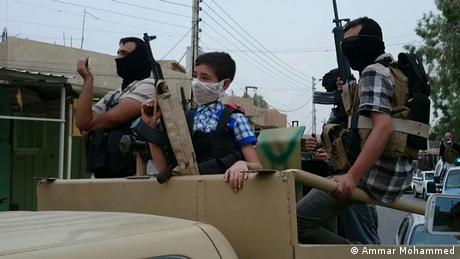 داعش في الموصل - رايات سود ومحاكم وجثث  سياسة واقتصاد  DWDE  16072014