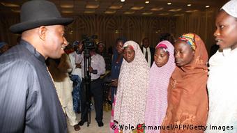 President goodluck Jonathan with relatives of the kidnapped girls