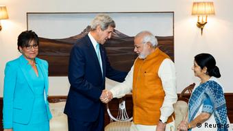 US Secretary of State John Kerry and Indian Prime Minister Narendra Modi (2nd R) shake hands as they are flanked by US Secretary of Commerce Penny Pritzker (L) and Indian External Affairs Minister Sushma Swaraj (R) at the Prime Minister's residence in New Delhi August 1, 2014
(Photo: REUTERS/Lucas Jackson)