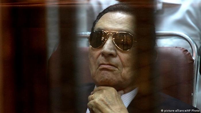  In this Saturday, April 26, 2014 file photo, ousted Egyptian President Hosni Mubarak attends a hearing in his retrial over charges of failing to stop killings of protesters during the 2011 uprising that led to his downfall, in the Police Academy-turned-court in the outskirts of Cairo, Egypt. AP Photo/Tarek el Gabbas, File