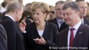 Merkel mit Putin und Poroschenko 06.06.2014 Benouville