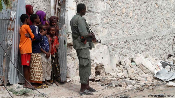 A Somalian soldier guards a prison complex in Mogadishu 