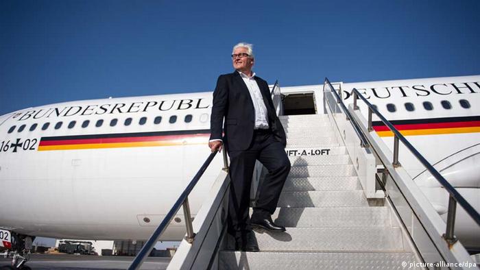 Steinmeier steps off a plane