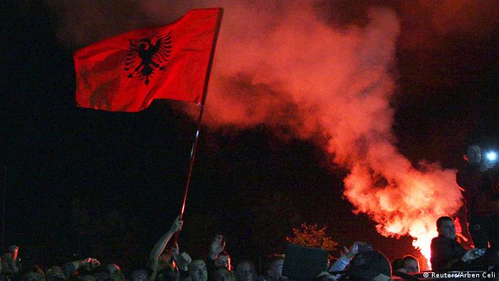 Albanian fans wait for Albania's national soccer players to arrive