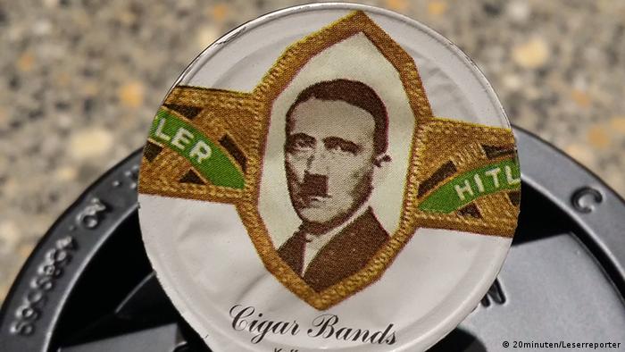 Adolf Hitler Porträt auf Kaffeesahne-Deckel der Handelskette Migros