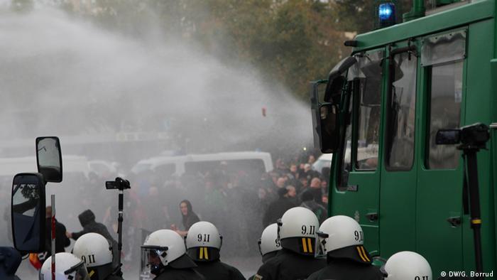 Water cannons are fired after protests escalated in Cologne
