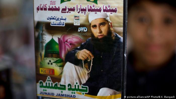 A vendor shows a DVD of Pakistan's Junaid Jamshed at a stall in Islamabad, Pakistan, Wednesday, Dec. 3, 2014
(AP Photo/B.K. Bangash)