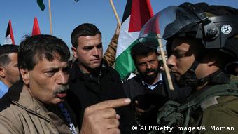 Ziad Abu Ein (l), shown taking part in the Ramallah protests