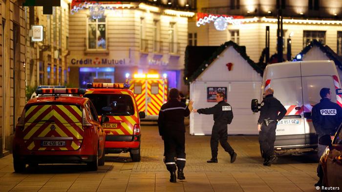 Police and rescue crews are seen near a Christmas market in Nantes