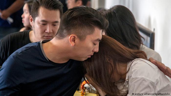 Anxious wait for relatives of missing AirAsia flight passengers.