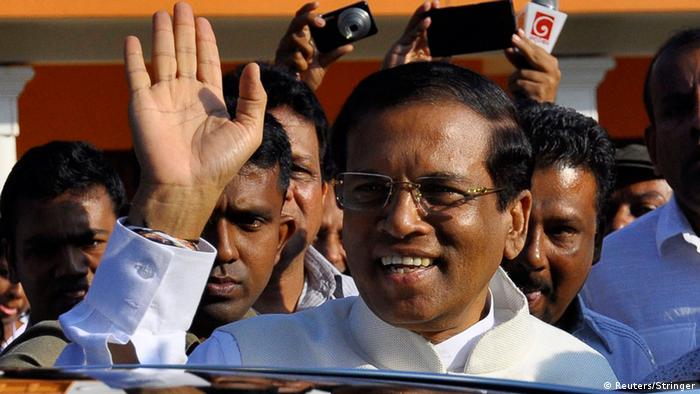 Presidential candidate Mithripala Sirisena waves at his supporters as he leaves after casting his vote for the presidential election in Polonnaruwa January 8, 2015
(Photo: REUTERS/Stringer)