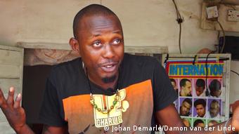 Joseph Agesoji a barbershop owner in Abuja