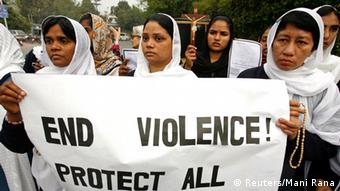 Women from the Christian community carry a sign during a protest after a suicide attack on a church in Lahore March 15, 2015
(Photo: REUTERS/Mani Rana)