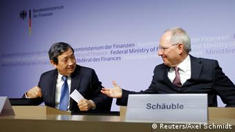 German Finance Minister Wolfgang Schaeuble (R) and China's Vice Premier Ma Kai attend a joint news conference in Berlin, March 17, 2015
(Photo: REUTERS/Axel Schmidt)