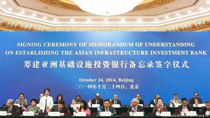 Representatives of founding member countries attend the signing ceremony of memorandum of understanding on establishing the Asian Infrastructure Investment Bank (AIIB) in Beijing, China, 24 October 2014