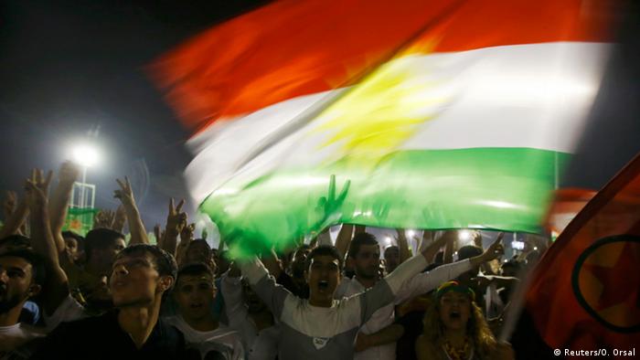 Kurdish flag being waved after Turkish elections. (Photo: REUTERS/Osman Orsal)