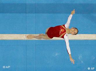 Yang Yilin Turnen Olympia China 2008.jpg
China's gymnast Yang Yilin performs on the balance beam during the womens' gymnastics individual all-around finals at the Beijing 2008 Olympics in Beijing, Friday, Aug. 15, 2008. (AP Photo/Rob Carr)