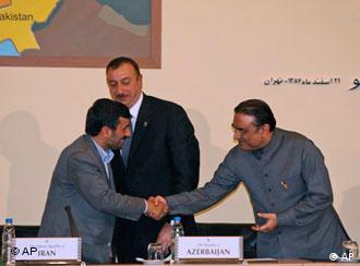Iranian President Mahmoud Ahmadinejad, left, shakes hands with Pakistani President Asif Ali Zardari
(AP Photo/Hasan Sarbakhshian)