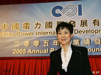 Li Xiaolin, the Vice Chairman and Chief Executive Officer of China Power attends the news conference of China Power International Development Limited Annual Results announcement in Hong Kong Friday, March 17, 2006. (AP Photo/Kin Cheung)
