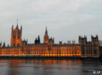 Dawn breaks over Britain's parliament, the Palace of Westminster in London, early Friday May 7, 2010, following a national General Election. Britain's two main parties are locked in a power struggle early Friday after an inconclusive General Election. (AP Photo/Tom Hevezi)