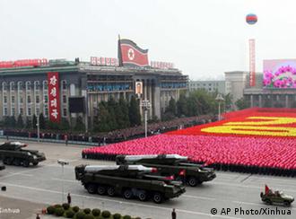 ** CORRECTS COUNTRY CODE ** In this photo released by China's Xinhua news agency, North Korean missiles on the trucks make its way during a massive military parade to mark the 65th anniversary of the communist nation's ruling Workers' Party in Pyongyang, North Korea on Sunday, Oct. 10, 2010. This year's celebration comes less than two weeks after Kim Jong Il's re-election to the party's top post and the news that his 20-something son would succeed his father and grandfather as leader. (AP Photo/Xinhua, Yao Dawei) ** NO SALES **