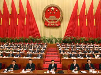 Top Chinese leaders, from left, Luo Gan, Wu Guanzheng, CPPCC Chairman Jia Qinglin, President Hu Jintao, Premier Wen Jiabao, Vice President Zeng Qinghong, and Li Changchun attend the Fourth Session of the Tenth National People's Congress (NPC) held at the Great Hall of the People in Beijing March 5, 2006. (AP Photo/Xinhua/Ma Zhancheng) 